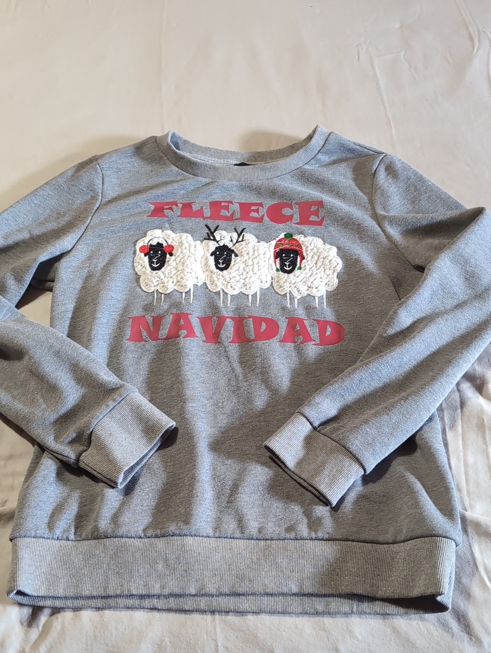 Sweet Claire Grey Sweatshirt with Red Graphic and Festive Embellishments